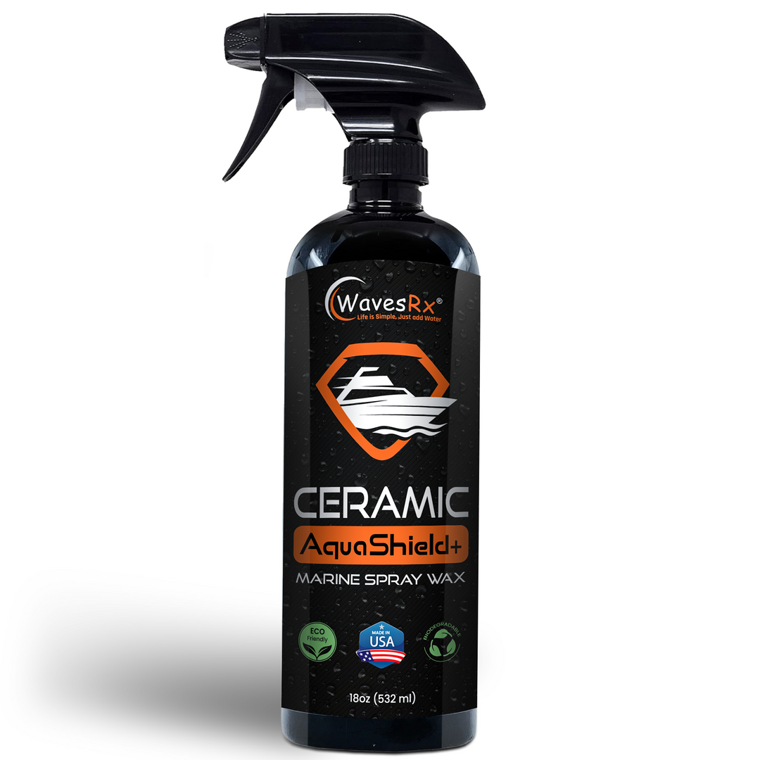 A black spray bottle with orange and white labeling that reads 'AquaShield Ceramic Marine Spray Wax'.
