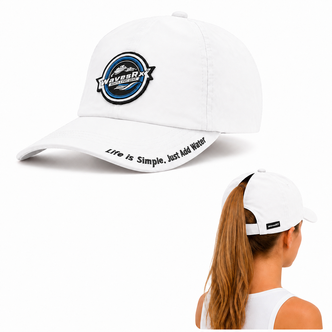 White baseball cap with a circular 'Everglade' logo on the front and 'Life is Simple, Just Add Water!' printed on the brim. A woman wearing the cap is shown from the back in a smaller inset view.