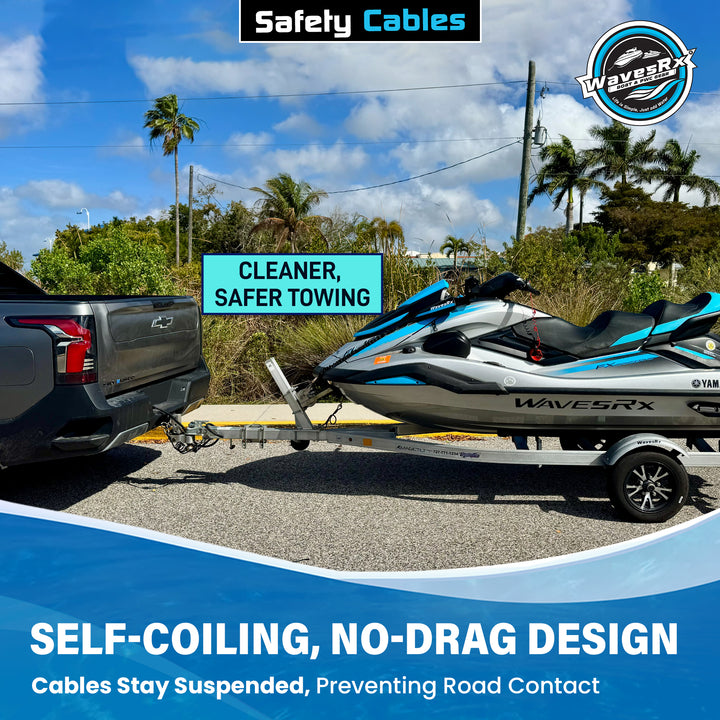 Truck towing a boat on a trailer with 'Safety Cables' branding and text about towing benefits.