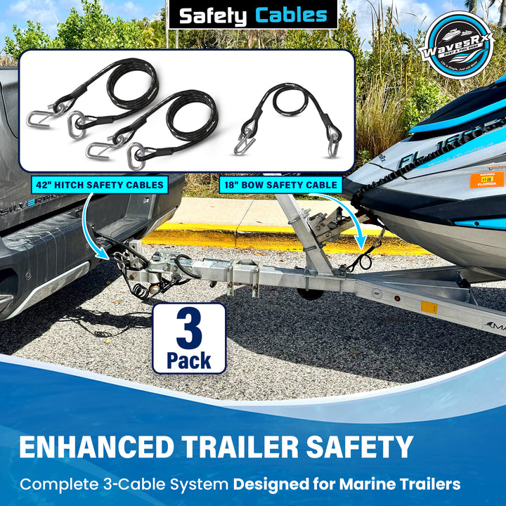 Safety cables for marine trailers with a car and boat on a gravel surface.